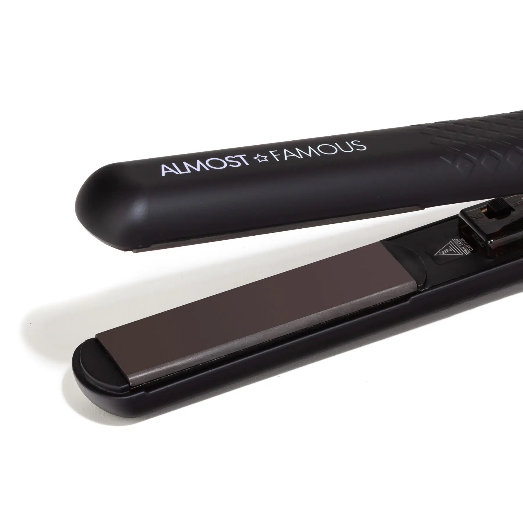 Hair styling tool Flat iron with gem infused plates Hair care products